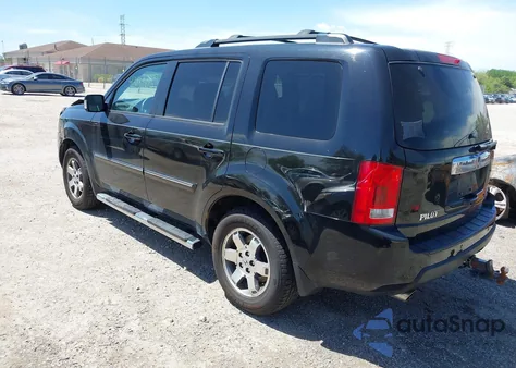 2011 Honda Pilot Touring из США, поврежденный, VIN 5FNYF4H97BB021458